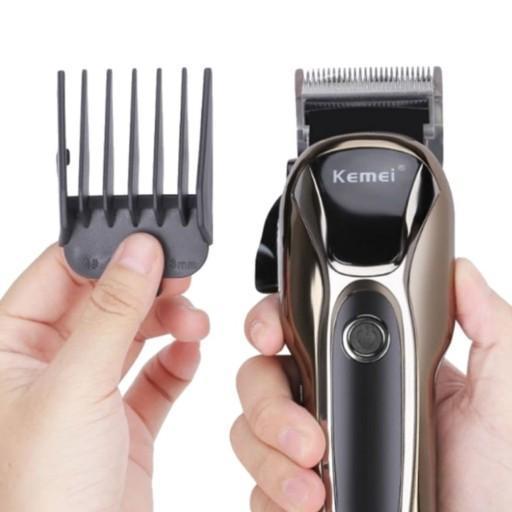 ماشین اصلاح شارژی کیمی مدل Kemei km-1990_60e0c2eaae8f9.jpeg ماشین اصلاح شارژی کیمی مدل Kemei km-1990 - Image 5